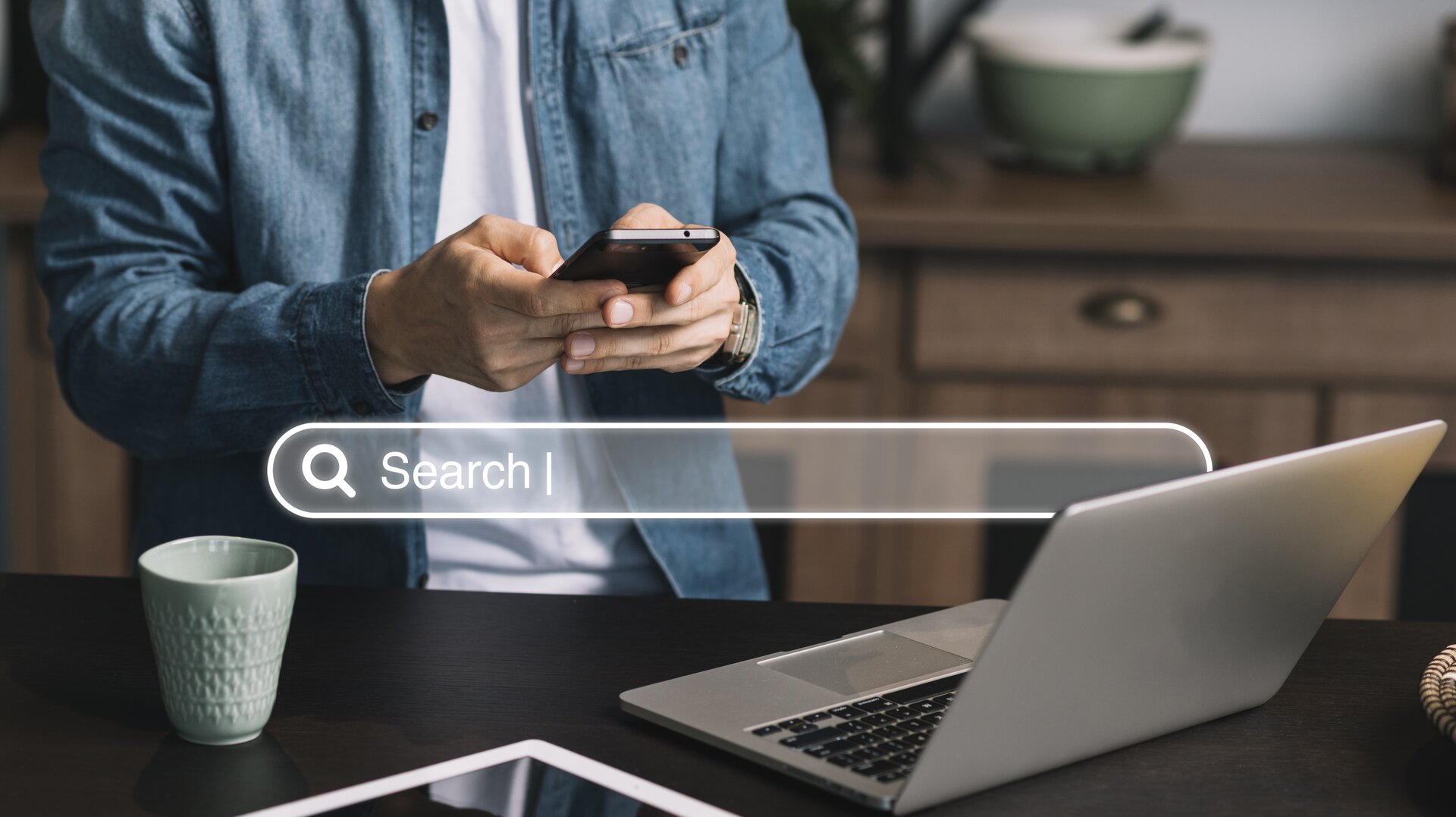 Person searching on Google with a website appearing at the top of the results